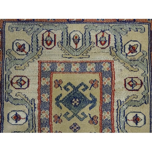 706 - Carpet / Rug  : Two runners with banded motifs to the central ochre coloured ground bordered by flor... 