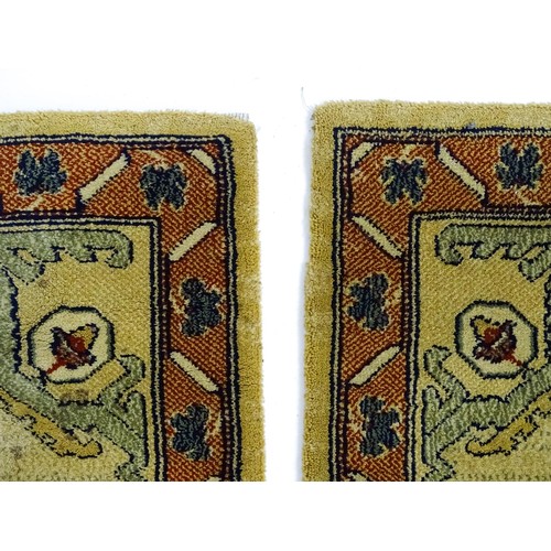 706 - Carpet / Rug  : Two runners with banded motifs to the central ochre coloured ground bordered by flor... 