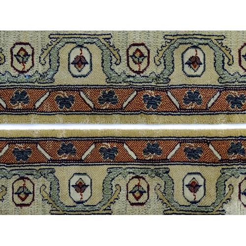 706 - Carpet / Rug  : Two runners with banded motifs to the central ochre coloured ground bordered by flor... 