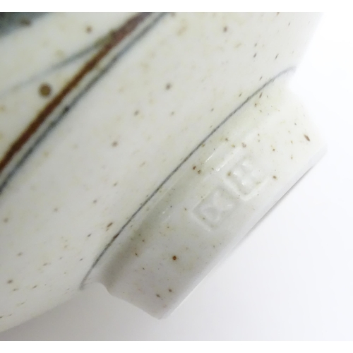 709 - A studio pottery footed bowl with brushwork detail by Derek Clarkson (1928-2013). Makers mark to foo... 