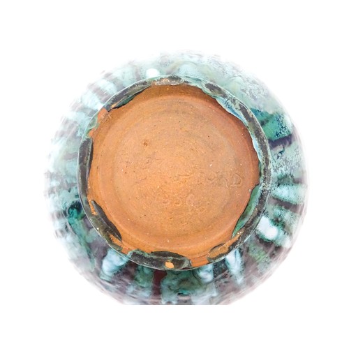 721 - A studio pottery bowl with drip glaze. Signed under R. Berrisford, 1959. Approx. 4 1/2