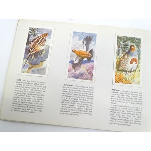 724 - A quantity of assorted tea picture cards to include examples from the Brooke Bond series Famous Peop... 