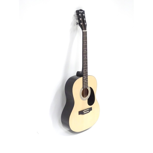 781 - Musical Instrument : a Martin Smith W-101-N-PK acoustic guitar, concert scale, approx 29 1/2