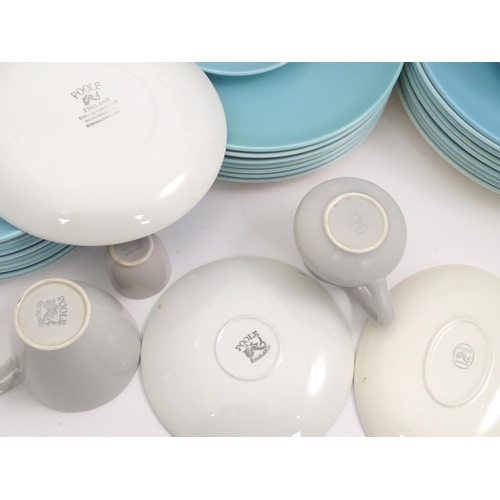 793 - A quantity of Poole Pottery twin tone blue and grey dinner wares to include plates, serving plates, ... 