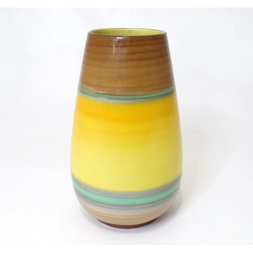 805 - A Shelley vase of tapering form with stripe detail. Marked under. Approx. 9 1/4