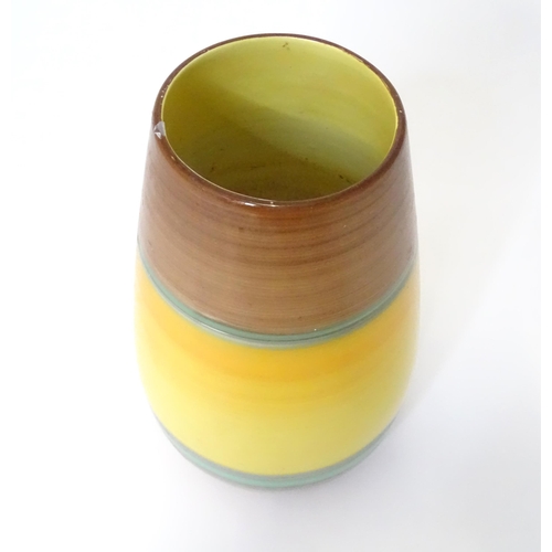805 - A Shelley vase of tapering form with stripe detail. Marked under. Approx. 9 1/4