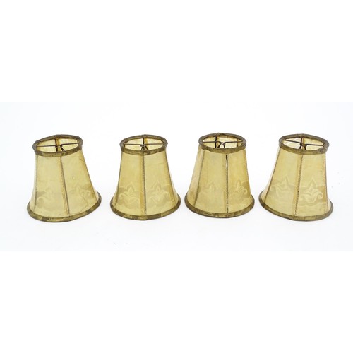 813 - Four small vellum style light shades. Approx. 4