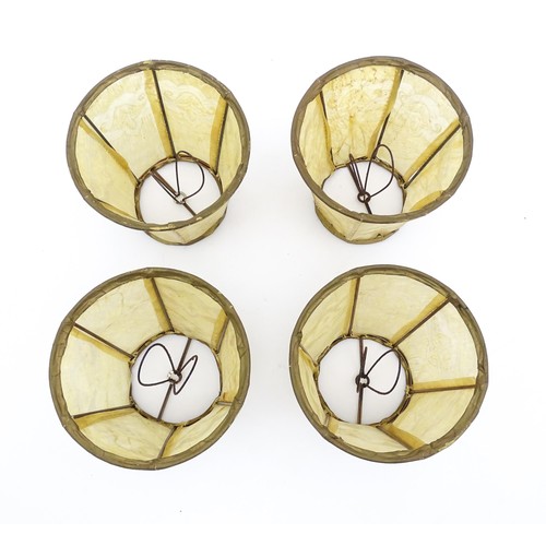 813 - Four small vellum style light shades. Approx. 4