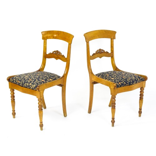 820 - A pair of 19thC side chairs with bowed top rails, carved mid rails, drop in seats and raised on turn... 