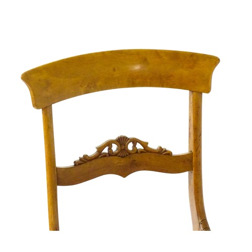 820 - A pair of 19thC side chairs with bowed top rails, carved mid rails, drop in seats and raised on turn... 
