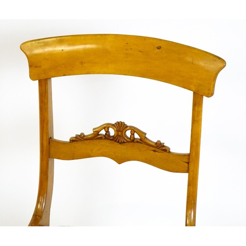 820 - A pair of 19thC side chairs with bowed top rails, carved mid rails, drop in seats and raised on turn... 