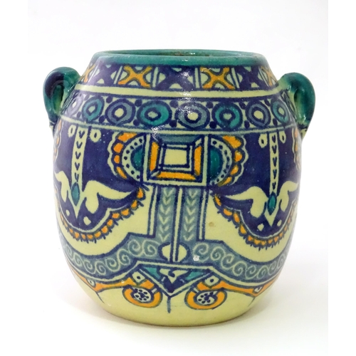 821 - Two ceramic items comprising a Continental dish with flower detail marked Pinto Italia, and a Iznik ... 