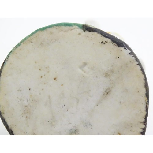 822 - Two Continental ceramic figures, depicting a Regency gentleman and a young lady. One indistinctly ma... 