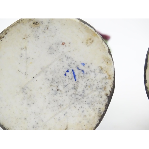 822 - Two Continental ceramic figures, depicting a Regency gentleman and a young lady. One indistinctly ma... 