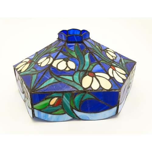 826 - A Tiffany style light shade decorated with flowers and foliage. Approx. 17