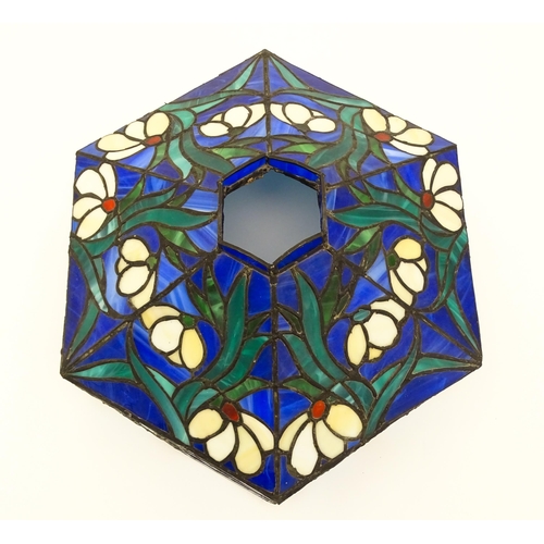 826 - A Tiffany style light shade decorated with flowers and foliage. Approx. 17