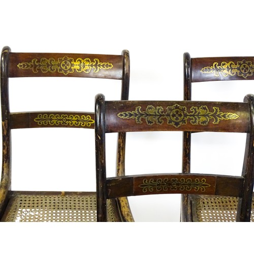 827 - A set of six 19thC brass inlaid dining chairs, with caned seats and drop in seats raised on sabre le... 