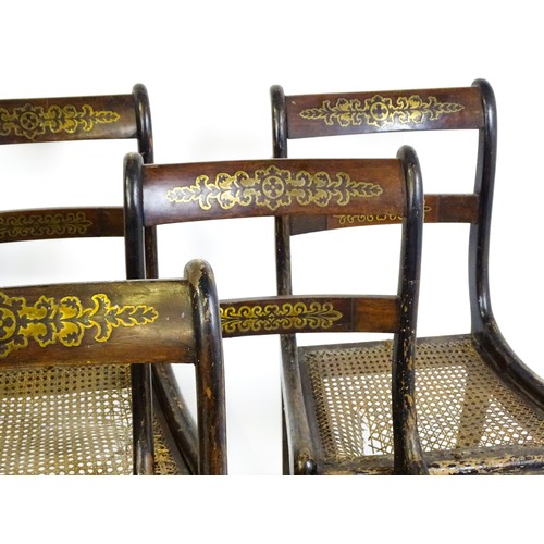827 - A set of six 19thC brass inlaid dining chairs, with caned seats and drop in seats raised on sabre le... 
