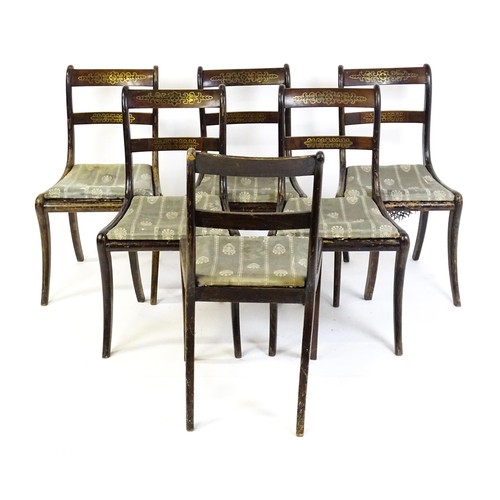 827 - A set of six 19thC brass inlaid dining chairs, with caned seats and drop in seats raised on sabre le... 