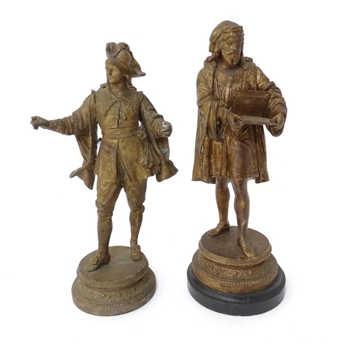 842 - Two 20thC cast figures to include an artist and a scholar. Largest approx. 11 1/2