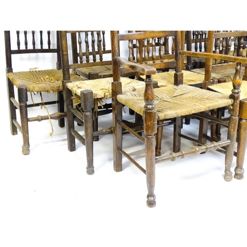 869 - A group of twelve 19thC spindle back dining chairs. Th largest 23