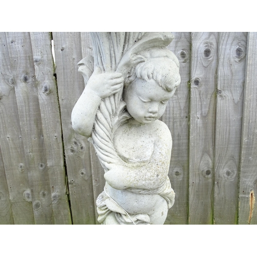 900 - Garden & Architectural : a large reconstituted stone bird bath modelled as a cherub, standing approx... 