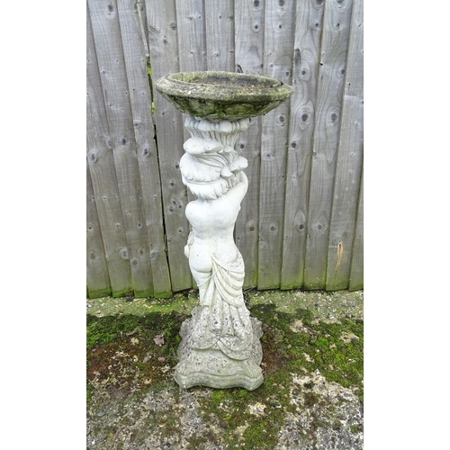 900 - Garden & Architectural : a large reconstituted stone bird bath modelled as a cherub, standing approx... 