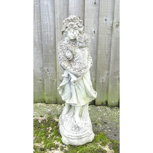 901 - Garden & Architectural : a reconstituted stone statue formed as a mother and child, standing approx ... 