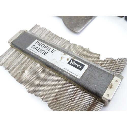 302 - A quantity of mid to late 20thC hand tools , to include saws, drills, planes, vice, socket set, rule... 