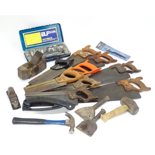 302 - A quantity of mid to late 20thC hand tools , to include saws, drills, planes, vice, socket set, rule... 