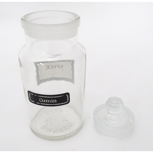 310 - A quantity of glass spice jars together with various spice labels, each jar approx 6