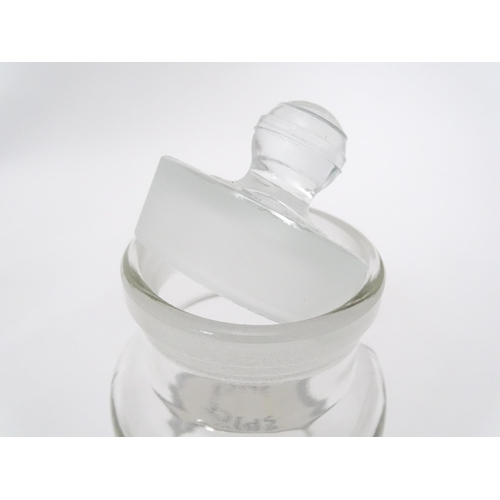 310 - A quantity of glass spice jars together with various spice labels, each jar approx 6