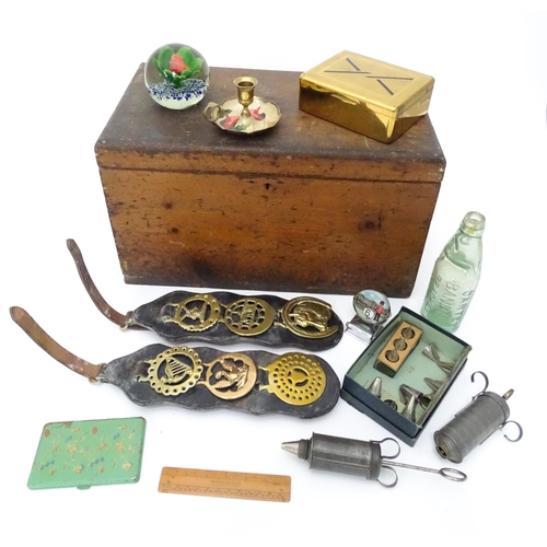 311 - A quantity of miscellaneous items contained within a wooden box to include a paperweight, a codd bot... 