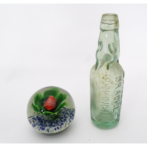 311 - A quantity of miscellaneous items contained within a wooden box to include a paperweight, a codd bot... 