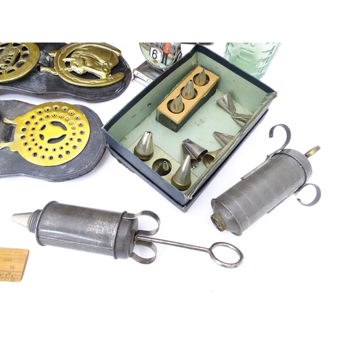 311 - A quantity of miscellaneous items contained within a wooden box to include a paperweight, a codd bot... 