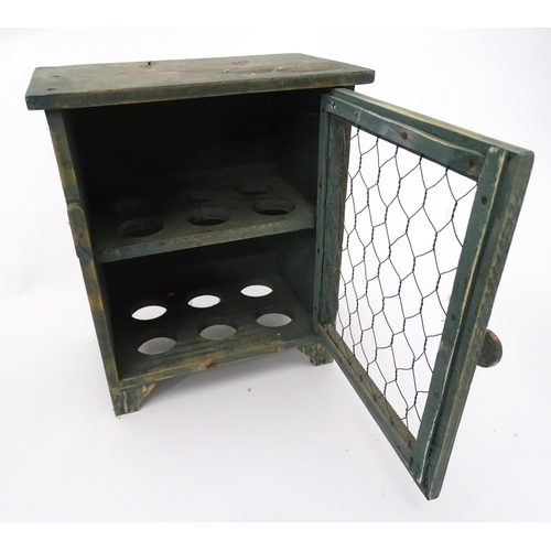 312 - A quantity of assorted kitchenalia to include a wooden chopping board, egg basket / holder, etc.