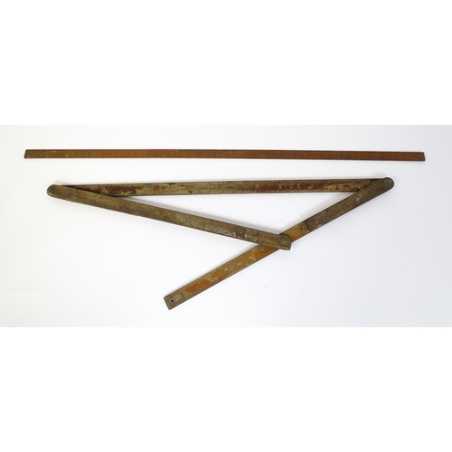 321 - An early 20thC architect's expanding rule stamped 'Smith Day & Co 1919', together with a mahogany ru... 