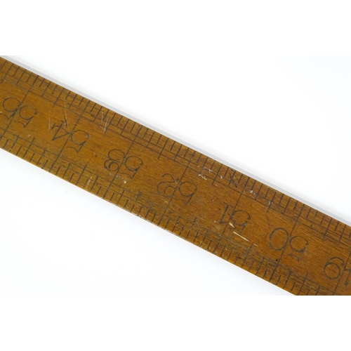 321 - An early 20thC architect's expanding rule stamped 'Smith Day & Co 1919', together with a mahogany ru... 