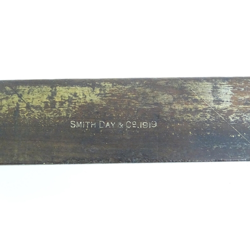 321 - An early 20thC architect's expanding rule stamped 'Smith Day & Co 1919', together with a mahogany ru... 