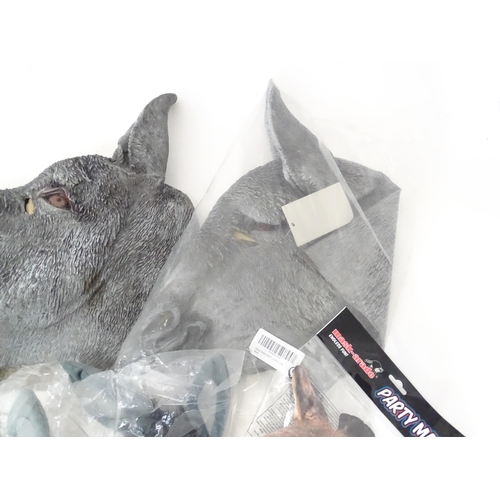 340 - A quantity of fancy dress items to include donkey masks, angel wings, etc.