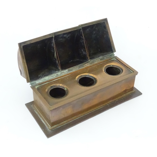 344 - A quantity of assorted metalwares to include a candlestick, copper chamberstick, inkwells, Art Nouve... 