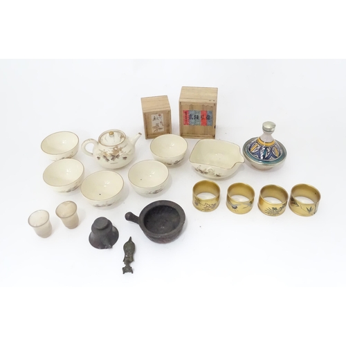 353 - A quantity of Oriental items to include Japanese tea wares with quail detail, a small cast deity, tw... 