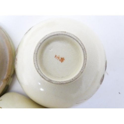 353 - A quantity of Oriental items to include Japanese tea wares with quail detail, a small cast deity, tw... 