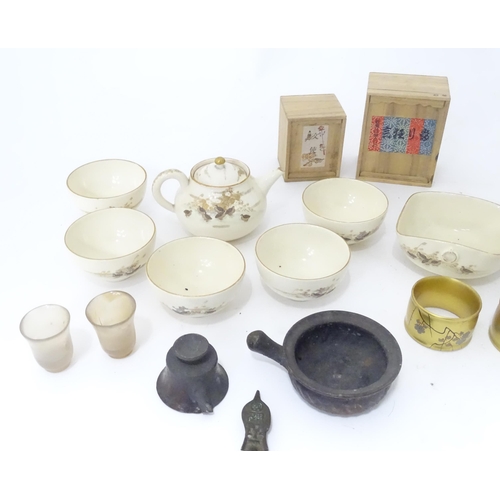 353 - A quantity of Oriental items to include Japanese tea wares with quail detail, a small cast deity, tw... 