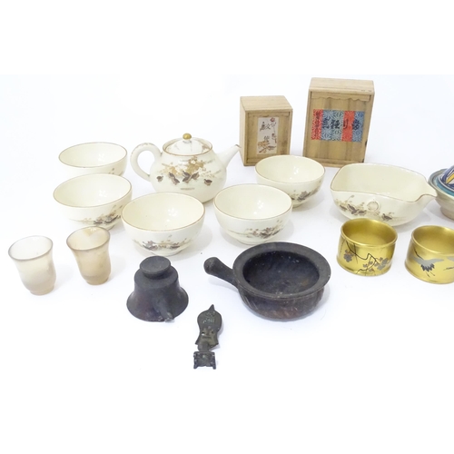 353 - A quantity of Oriental items to include Japanese tea wares with quail detail, a small cast deity, tw... 