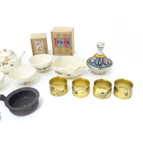 353 - A quantity of Oriental items to include Japanese tea wares with quail detail, a small cast deity, tw... 