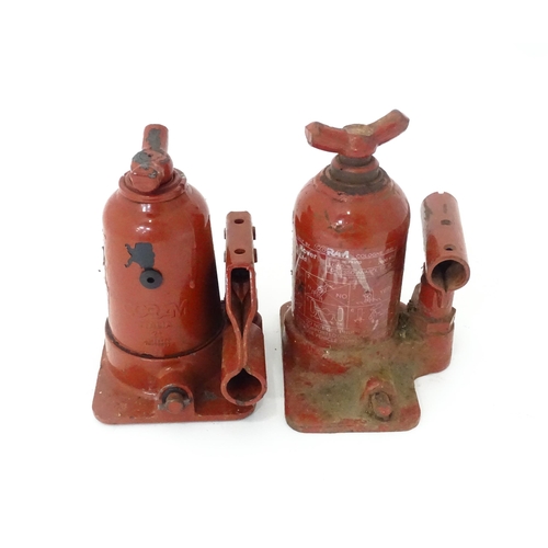 355 - Two Land Rover / Coram Italy LR031924 in-vehicle bottle jacks, each approx 7