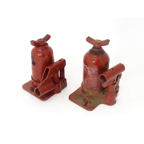 355 - Two Land Rover / Coram Italy LR031924 in-vehicle bottle jacks, each approx 7