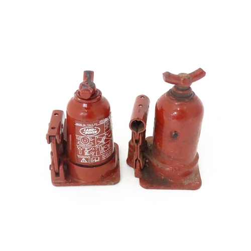 355 - Two Land Rover / Coram Italy LR031924 in-vehicle bottle jacks, each approx 7