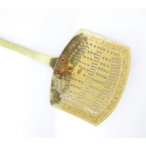 359 - A quantity of kitchenalia to include a strainer / skimmer, sugar crusher, salt and pepper grinders, ... 